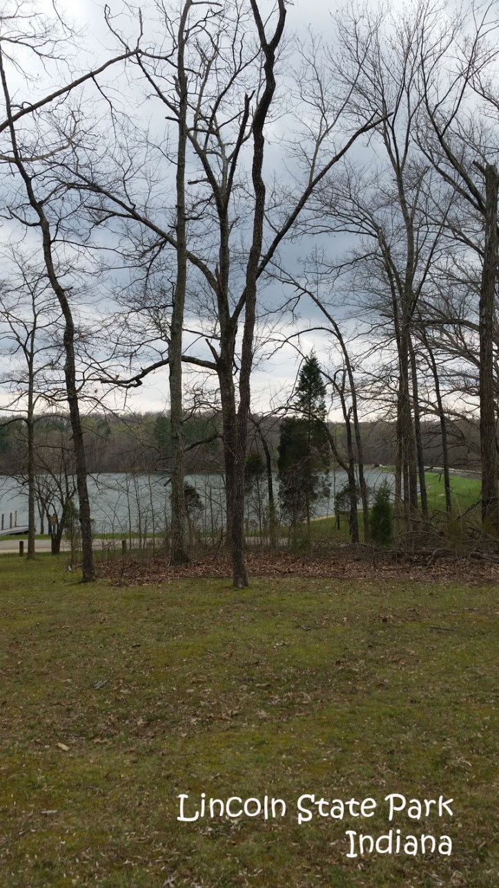 Hiking near the lake at Lincoln State Park in Indiana as storm clouds roll in