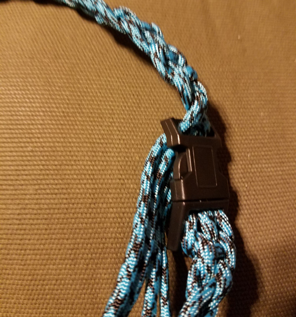 Making paracord sleeping bag straps: How to attach the end of the paracord braid to the end of the buckle.